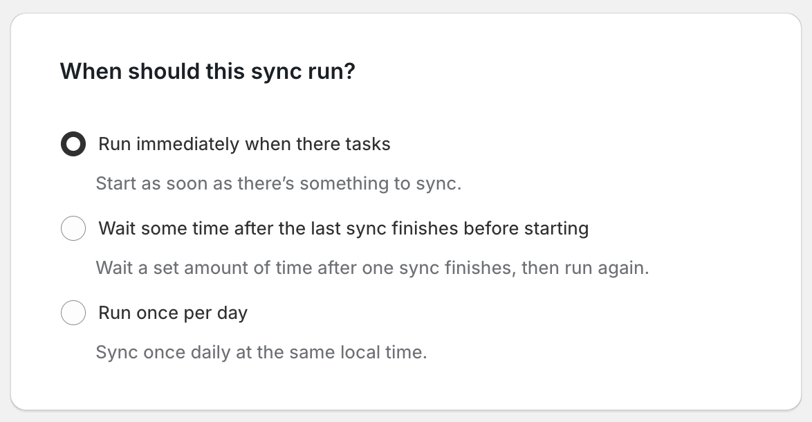 Advanced settings showing "Run immediately when there are tasks" selected for a Shopify to Airtable sync